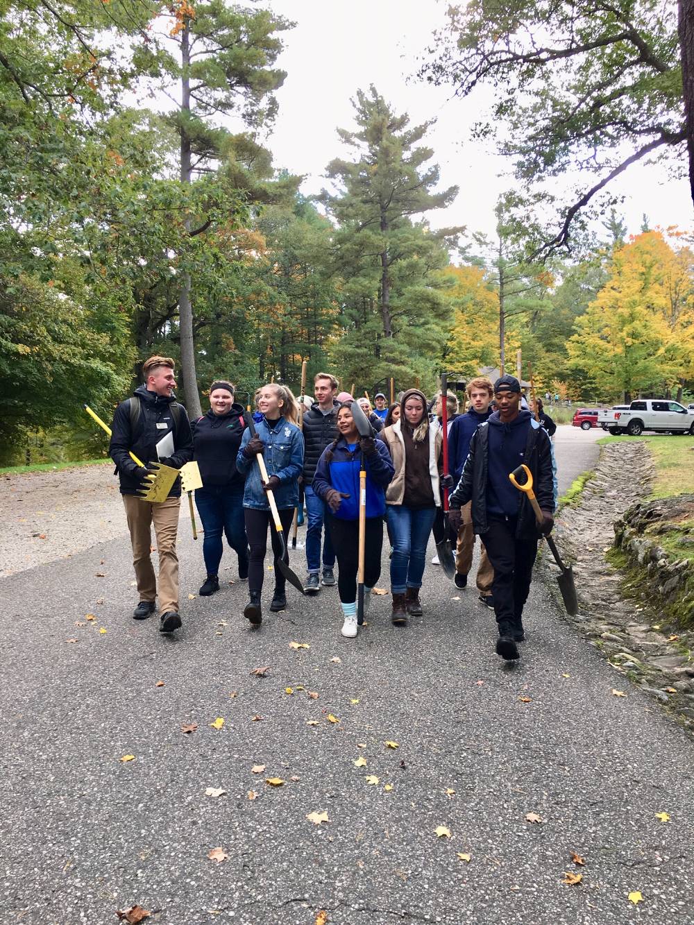 students walk to service